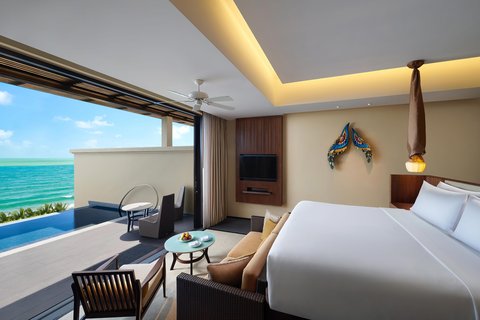 Habitación Premium de un dormitorio con piscina y vista al mar_Cama tamaño King
