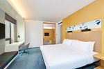 Sunny Suite, 1 Bedroom Suite, 1 King, City view, High floor, Balcony