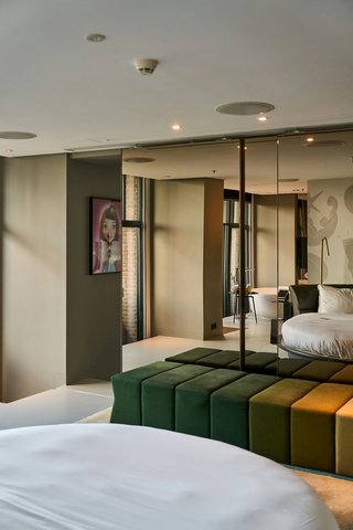 Bed Reflected in Mirror