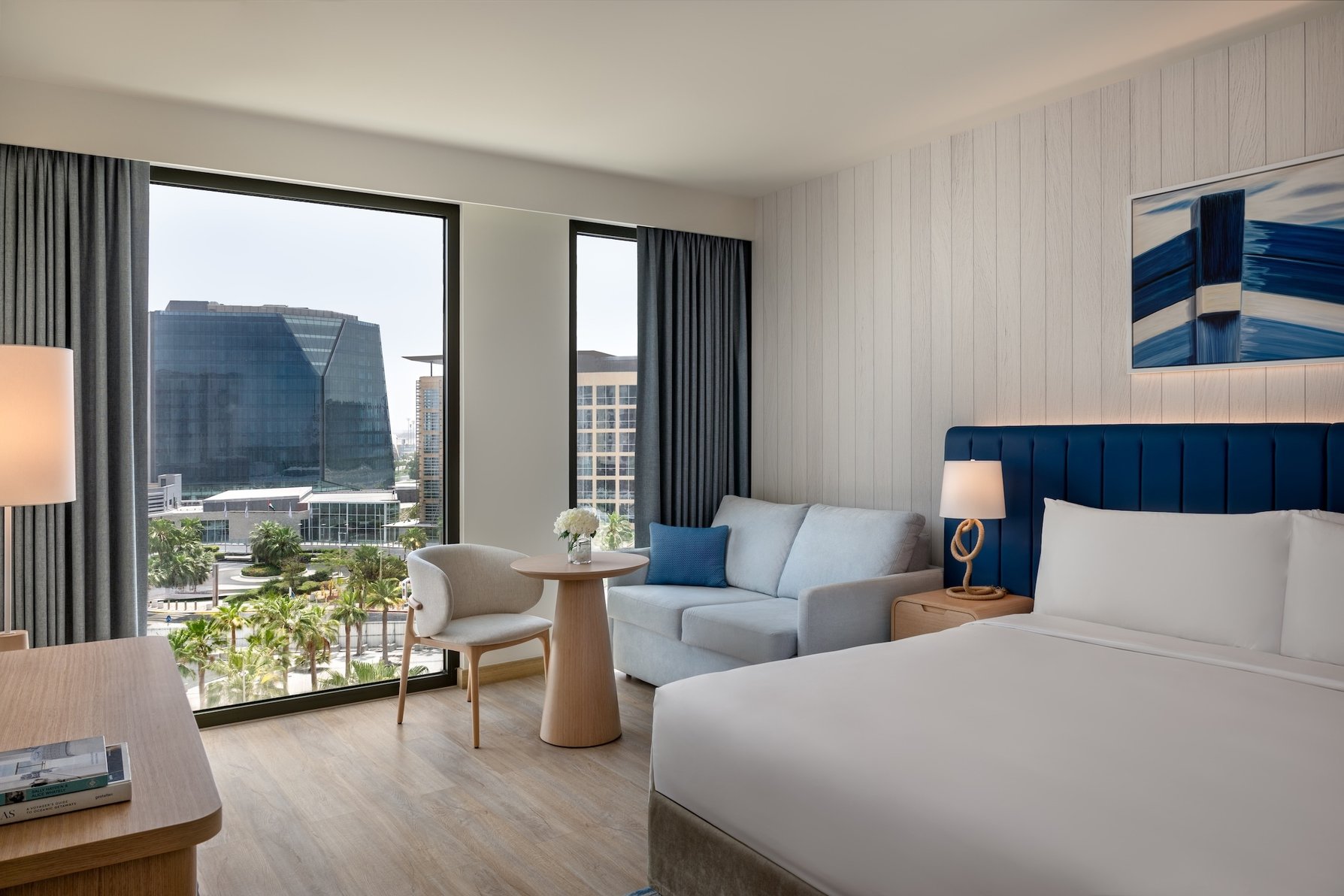 Crowne Plaza ABU DHABI - YAS ISLAND by IHG Room Type - 1 Bedroom Suite Plaza View Living Dining Theme Park Crowne Plaza ABU DHABI - YAS ISLAND by IHG Room Type - 1 Bedroom Suite Plaza View Living Dining Theme Park